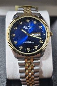 MIYKON Mens Two-Tone Stainless Steel Watch  Blue Sunburst Dial  Crystal Hour Markers  DayDate Display  New in Box