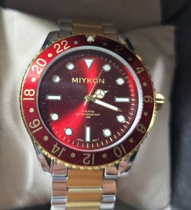 MIYKON Mens Two-Tone Stainless Steel Watch  Red Sunburst Dial  Red 24-Hour Bezel  Japanese Quartz Movement  New in Box