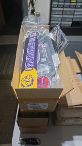 2 Boxes of LICENSED Sports License Plates