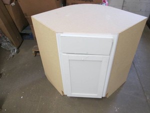 Corner cabinet with curved back, widest part of top is 43 inches and 30 deep