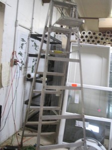 Aluminum folding ladder with added extension at the bottom