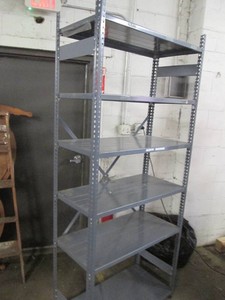 Metal storage shelf with 6 shelves, 3 x 18 and 7 feet tall