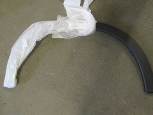 Driver side front wheel moulding for unknown vehicle