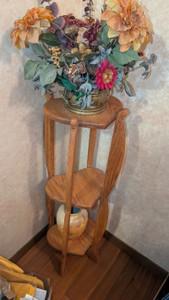 Heart-Shaped three tiered plant stand with fake plant