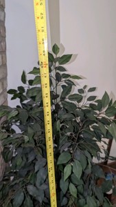 4 ft tall fake plant with wicker basket
