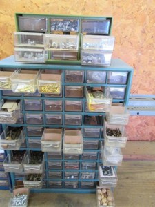 Multi-Drawer (50) benchtop hardware organizer with assorted fasteners, hardware and other content with 2nd 9-drawer organizer