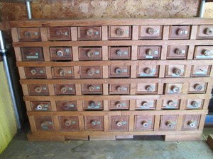 Vintage wood multi-drawer benchtop organizer with 42 compartmentalized drawers approx 30x9x21in