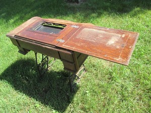 Antique wood folding top sewing machine table with cast iron legs no sewing machine