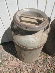 Vintage milk can with lid approx 25in tall
