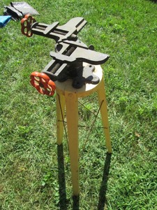 Vintage metal Stanley corner clamp affixed to 37in tripod style stand