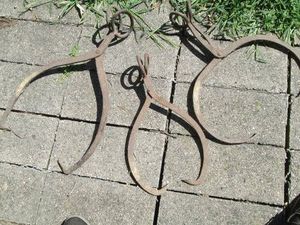 Collection of antique metal ice tongs