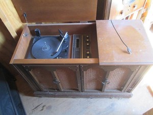Vintage wood record player and 8-track console cabinet approx 40x17x27in