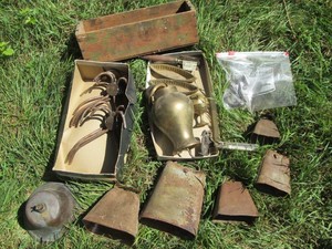 Antique cow bells, coat hooks, wood cheese box, brass nik naks and more