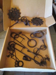Antique forged metal hand operated implements