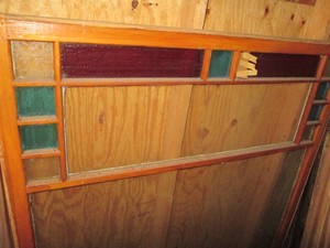 Vintage 52x62in wood framed window with colorful stained glass top boarder