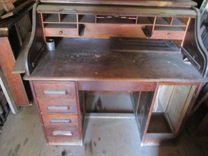 Vintage wood roll top secretary desk on caster wheels with lots of storage roll top a little stubborn approx 48x30x46in
