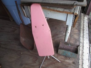 Vintage metal child size wheelbarrow and ironing board plus long handle metal dust pan