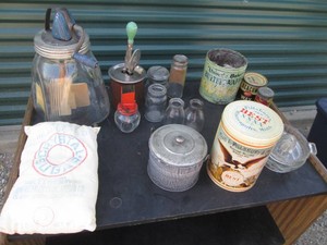 Depression Era glass juicers, mixerea, lidded jars, misc glassware, tins and more