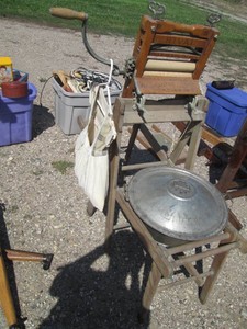 Antique dual sided wood wash station with metal lidded pot, Rival Wringer and clothes pin casdy