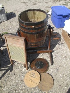 Vintage wood keg style hand cranking washer with wards wash board