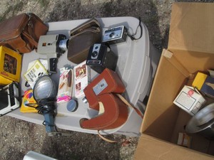 Variety of Vintage Kodak cameras, Sears movie camera, misc accessories, treble lights and replacement bulbs