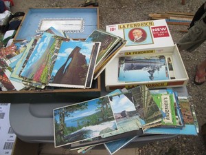Cigar boxes full of vintage post cards from across the United States some with stamps, some not used