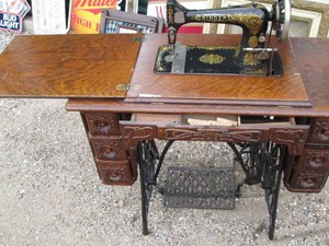 Antique Singer wood and cast iron sewing machine and seamstress table