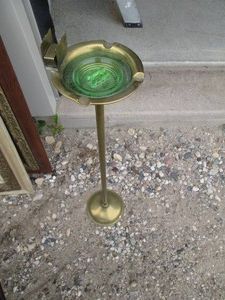 Antique freestanding brass tone ashtray with Uranium glass insert