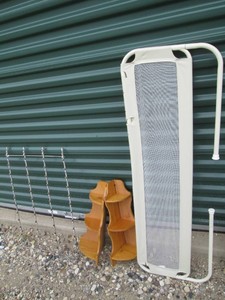 Protective bed safety guard, decorative wood wall shelves and metal framed hat holder