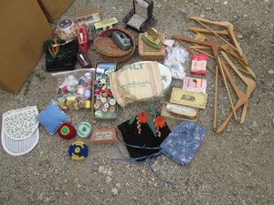 Wide variety of threads, stick pins, pin cushion, wood hangers sewing notions and more