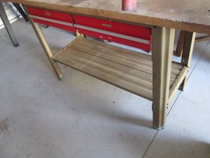 Metal 2-drawer workbench with lower shelf and wood top 60x24x33in