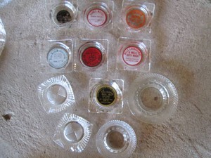 Advertisement and other vintage glass ashtrays