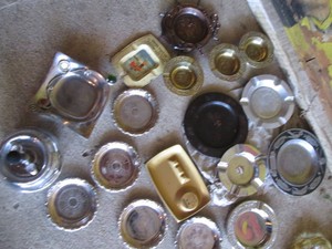 Collection of metal ashtrays