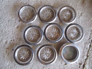 Glass and metal trim vintage ashtrays
