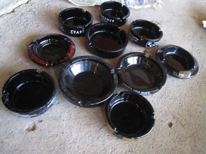 Dark vintage glass ashtrays