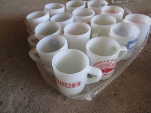 Variety of vintage advertisement Fire king mugs