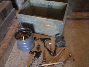 Vintage wood box, metal reloading supplies and empty shotgun casings