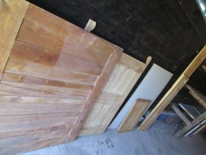 Variety of vintage wood furniture parts and planks