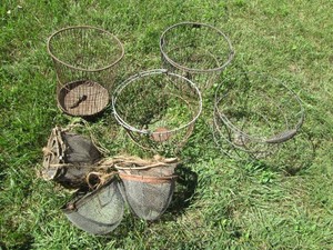 Bundle of vintage metal wire baskets and planters