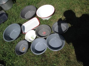 Variety of vintage enamelware bakeware pans and bowls