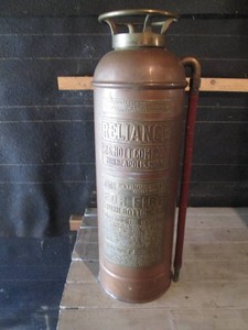 Antique metal Reliance WS Knott Company fire extinguisher