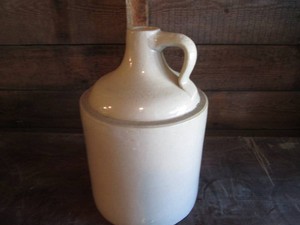 Vintage un-marked Stoneware jug with handle