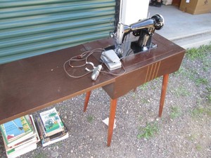 Antique Kenmore sewing machine with wood seamstress table