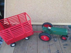 Die cast replica Oliver row crop tractor and Ertl die cast replica hay wagon