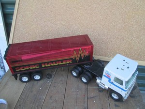 Vintage die cast Nylint semi and Buddy L trailer