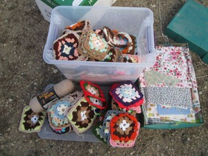 Variety of knit blanket squares and fabric material
