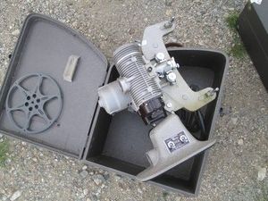 Vintage Bell & Howell 8mm projector with travel case