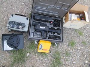 Vintage Panasonic color TV camera with accessories in hardside case plus Sears Du-all eight film projector, Kodak press tape universal splicer and misc blank VHS tPes