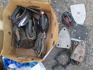 Collection of vintage steam and dry irons with extra ironing plates