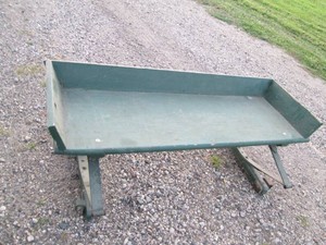 Vintage green wood wagon seat with metal leaf springs
